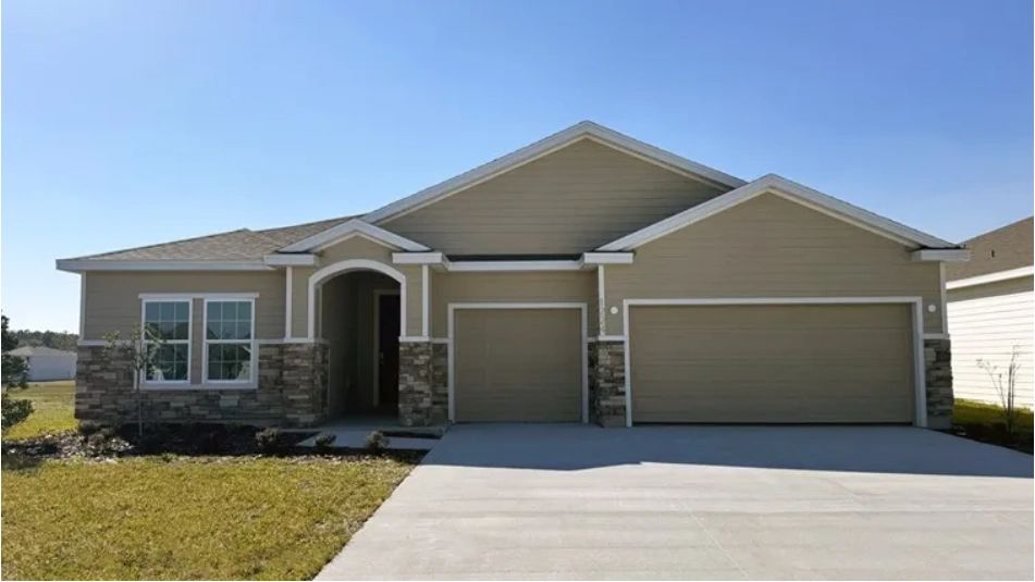 Modern single-story home in a Gainesville subdivision with a 3-car tandem garage