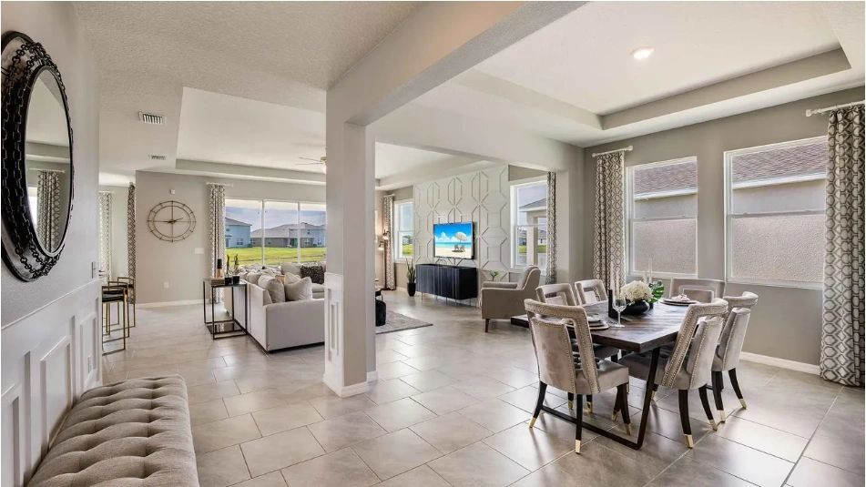 Staged open-concept living room in the modern Gainesville subdivision home