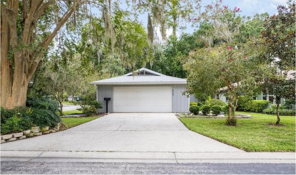 Gray single-story home in Gainesville, house number 8525, front exterior view